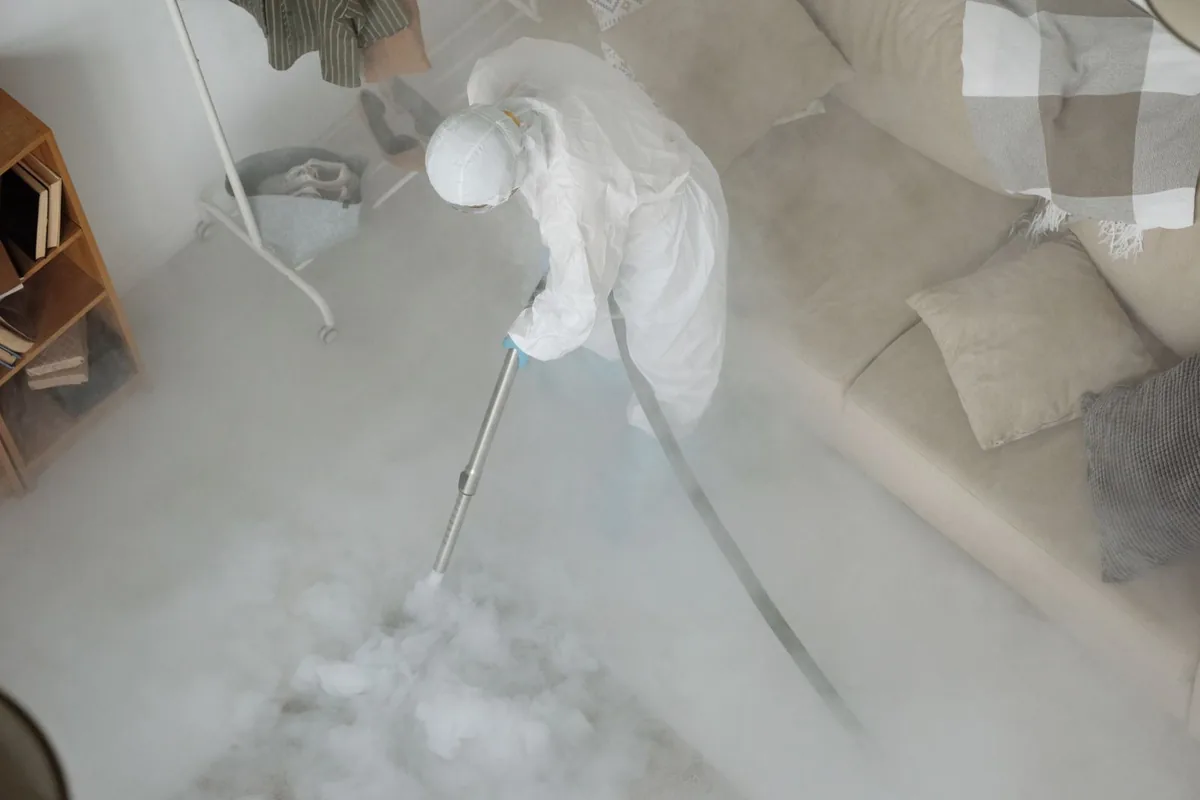 Biohazard cleanup technician in protective equipment, Old Orchard, PA